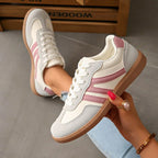 Sneaker donna con lacci e striscia laterale