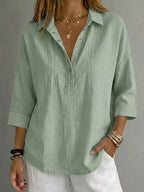 Blusa donna con abbottonatura e maniche 3/4