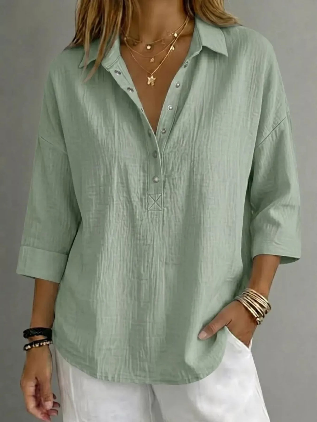 Blusa donna con abbottonatura e maniche 3/4