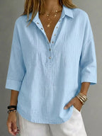 Blusa donna con abbottonatura e maniche 3/4