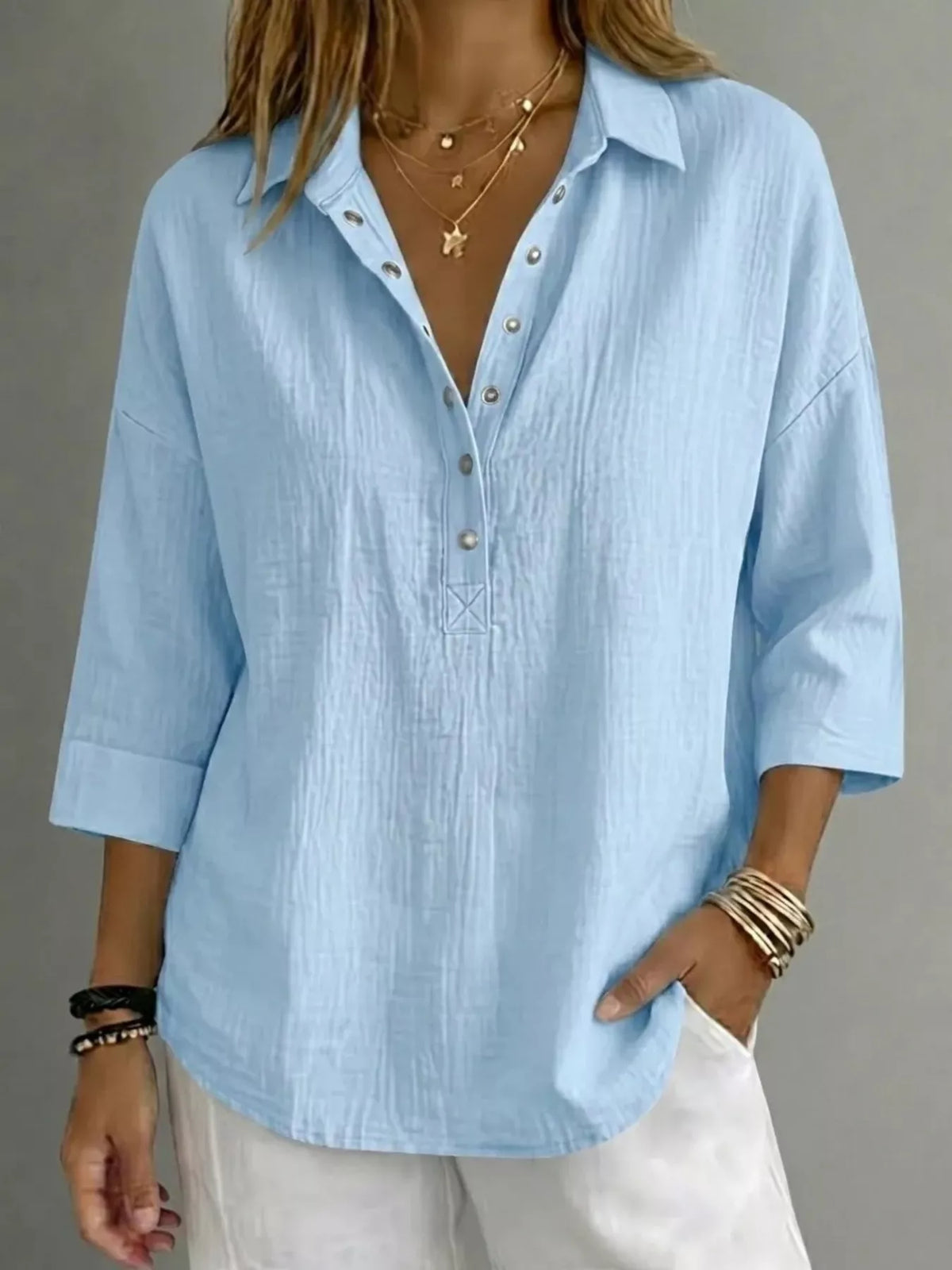Blusa donna con abbottonatura e maniche 3/4