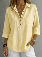 Blusa donna con abbottonatura e maniche 3/4