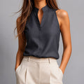 Blusa donna senza maniche con collo alto