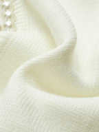 Alina | Cardigan con perle e orlo sfrangiato