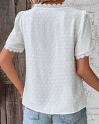 Blusa da donna in pizzo con scollo a V