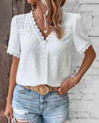 Blusa da donna in pizzo con scollo a V