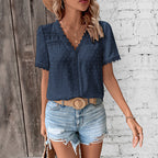 Blusa da donna in pizzo con scollo a V