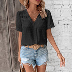 Blusa da donna in pizzo con scollo a V