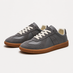 Sneaker uomo con tomaia a due finiture e suola piatta