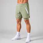 Pantaloncini sportivi uomo 2 in 1 con interno aderente