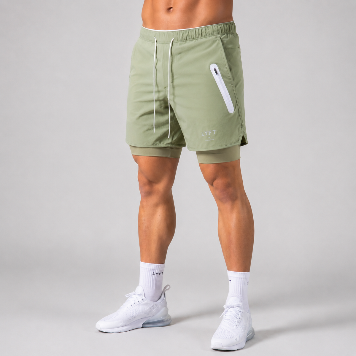 Pantaloncini sportivi uomo 2 in 1 con interno aderente