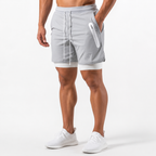 Pantaloncini sportivi uomo 2 in 1 con interno aderente