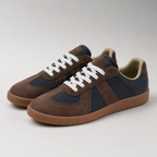 Sneaker uomo con tomaia a due finiture e suola piatta