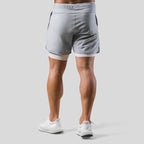 Pantaloncini sportivi uomo 2 in 1 con interno aderente