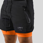 Pantaloncini sportivi uomo 2 in 1 con interno aderente
