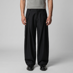 Pantaloni uomo con pince e gamba ampia