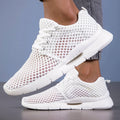 Sneaker uomo in mesh con suola flessibile