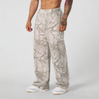 Pantaloni jogging uomo ampi con fantasia mimetica