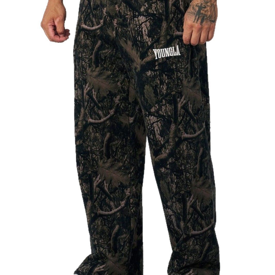 Pantaloni jogging uomo ampi con fantasia mimetica