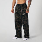 Pantaloni jogging uomo ampi con fantasia mimetica