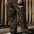 Pantaloni jogging uomo ampi con fantasia mimetica