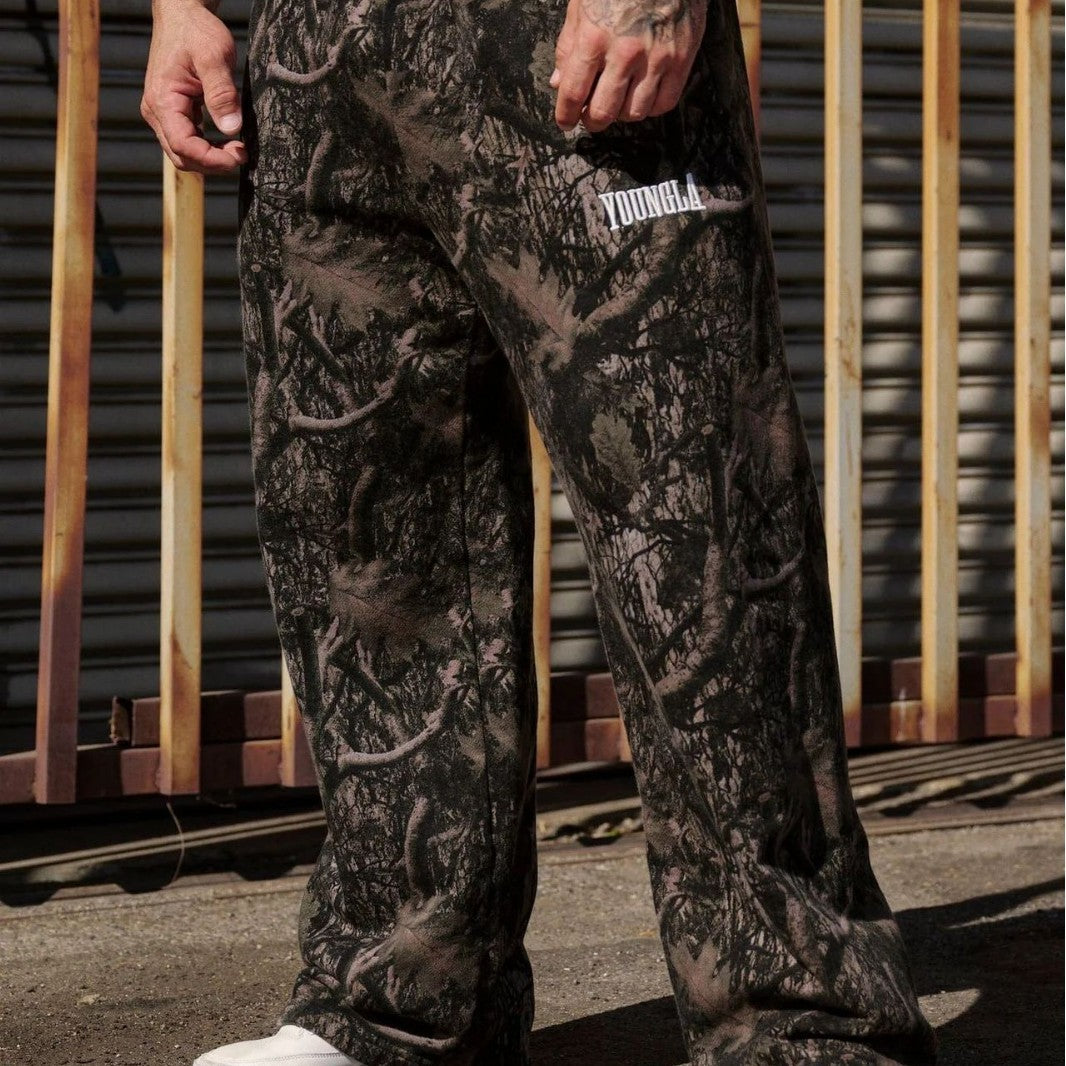 Pantaloni jogging uomo ampi con fantasia mimetica