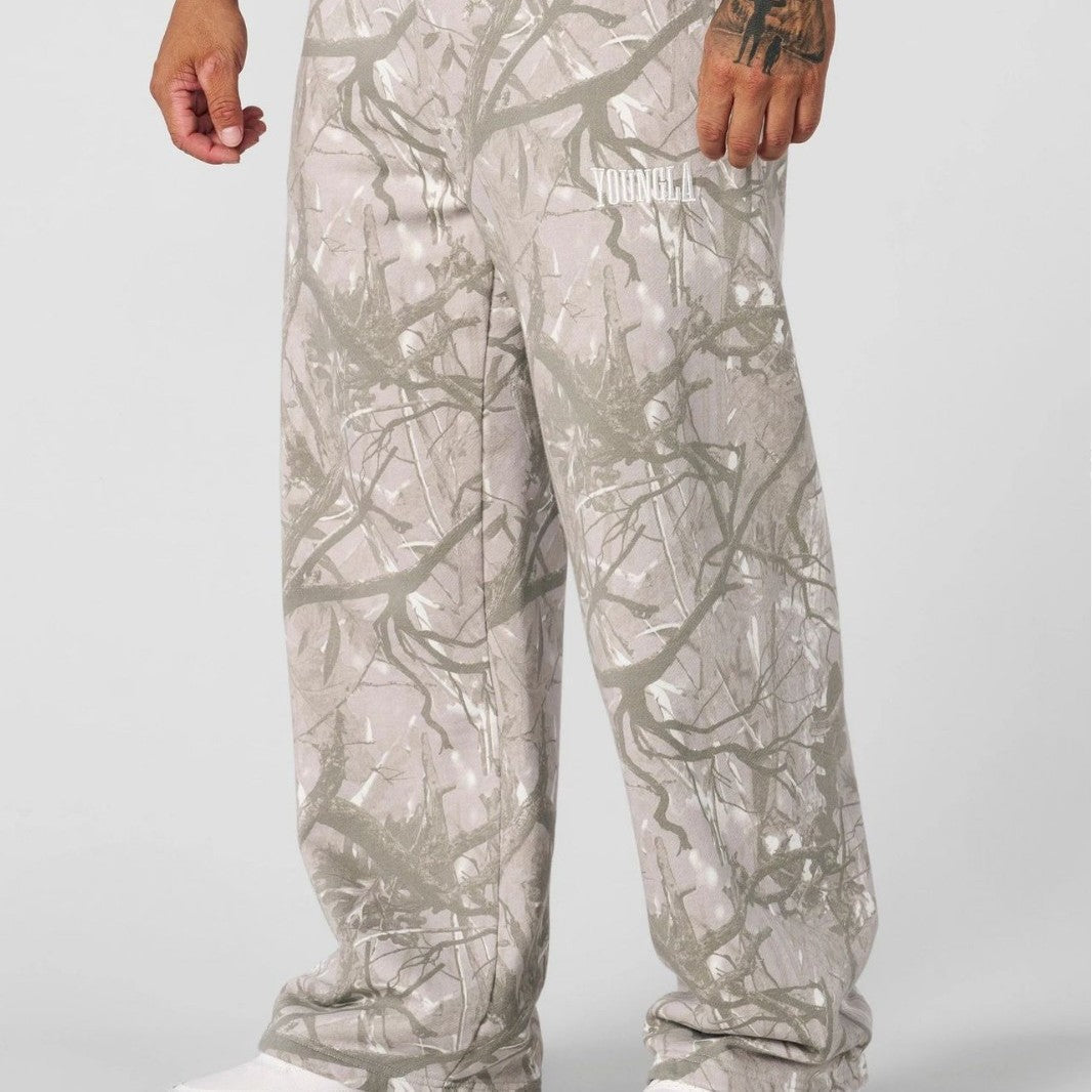 Pantaloni jogging uomo ampi con fantasia mimetica