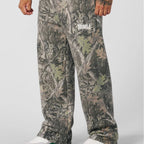Pantaloni jogging uomo ampi con fantasia mimetica