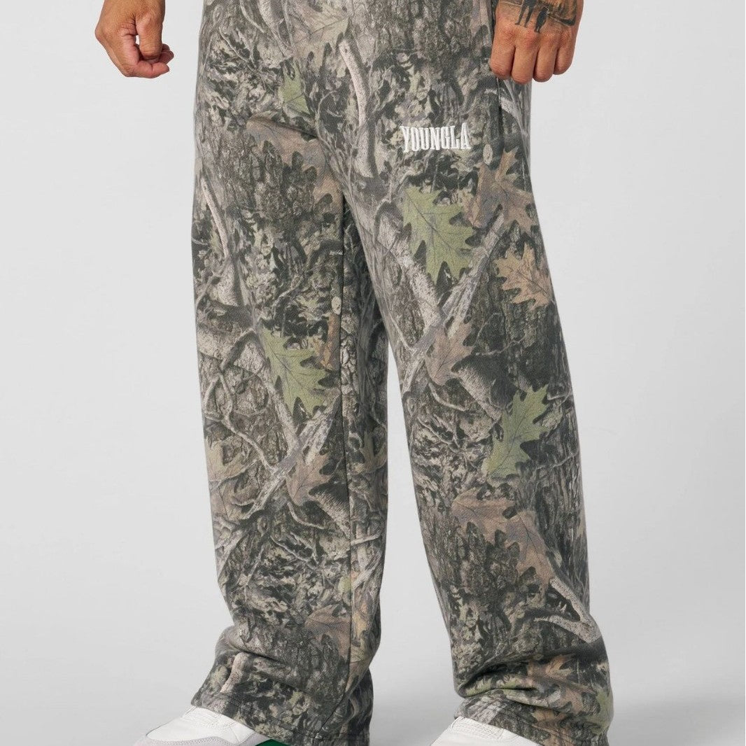 Pantaloni jogging uomo ampi con fantasia mimetica