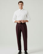 Pantaloni uomo con pince in tinta unita