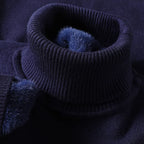 Dolcevita uomo in maglia fine con bordi a costine
