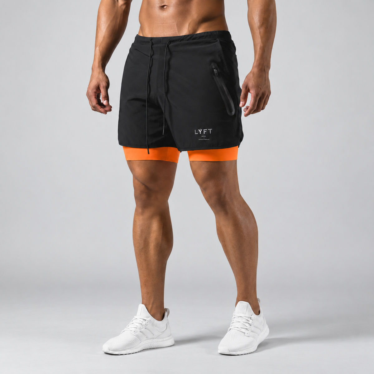 Pantaloncini sportivi uomo 2 in 1 con interno aderente