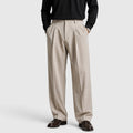 Pantaloni uomo con pince e vita alta