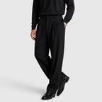 Pantaloni uomo con pince e vita alta