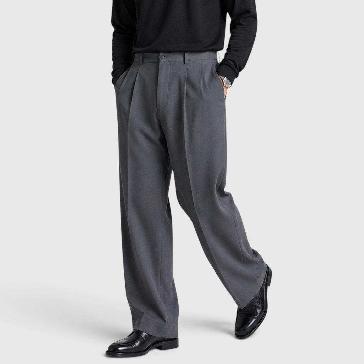 Pantaloni uomo con pince e vita alta