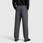 Pantaloni uomo con pince e vita alta