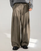 Pantaloni donna ampi con pince e cintura