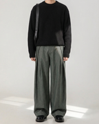 Pantaloni donna ampi con pince e cintura
